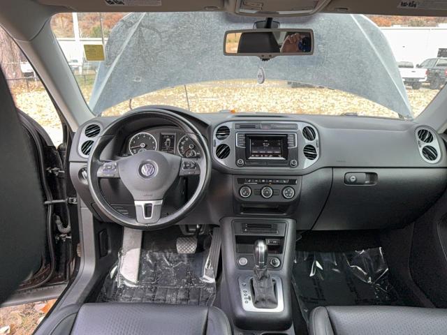 WVGAV7AX6GW516621 - 2016 VOLKSWAGEN TIGUAN S BLACK photo 9