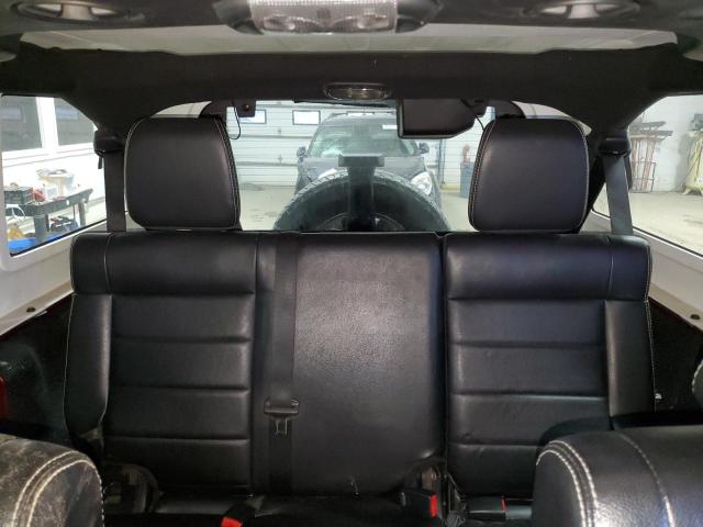 1C4BJWEG9CL207214 - 2012 JEEP WRANGLER U SAHARA ბურგუნდია ფოტო 10