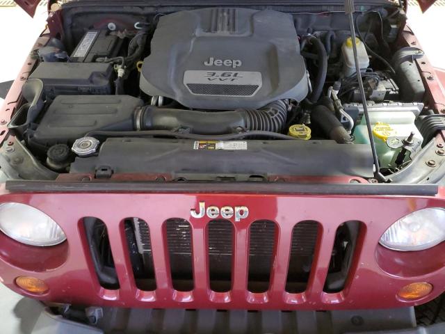 1C4BJWEG9CL207214 - 2012 JEEP WRANGLER U SAHARA ბურგუნდია ფოტო 12