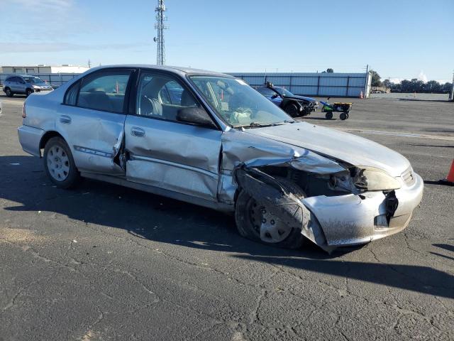 2HGEJ6611YH501204 - 2000 HONDA CIVIC BASE SILVER photo 4
