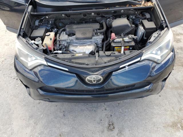 JTMZFREV1JJ176727 - 2018 TOYOTA RAV4 LE GREEN photo 12