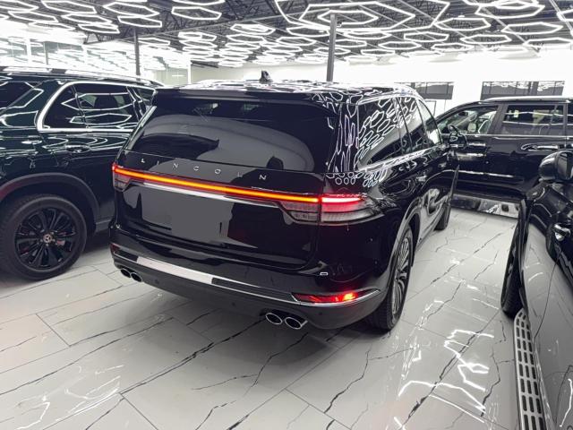 5LM5J7WC7RGL00595 - 2024 LINCOLN AVIATOR RESERVE შავი ფოტო 4