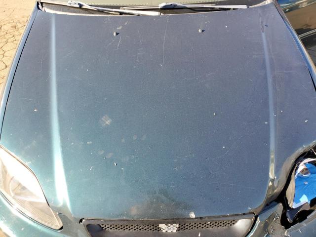 1HGEJ8645VL005388 - 1997 HONDA CIVIC EX GREEN photo 11