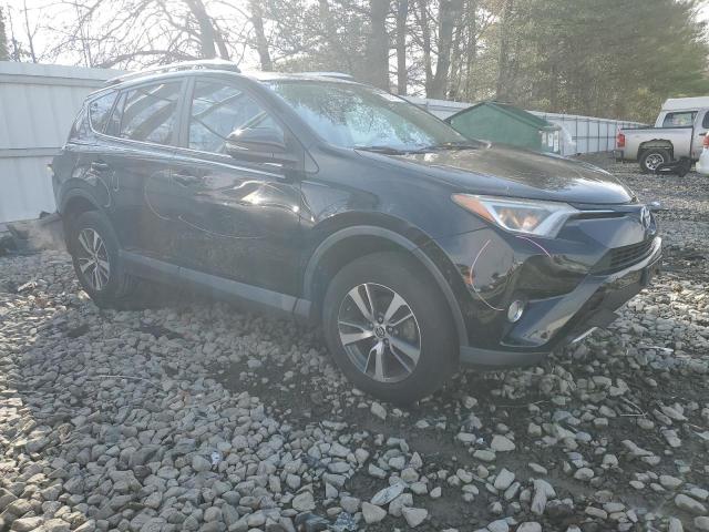 2T3RFREVXGW444443 - 2016 TOYOTA RAV4 XLE BLACK photo 4