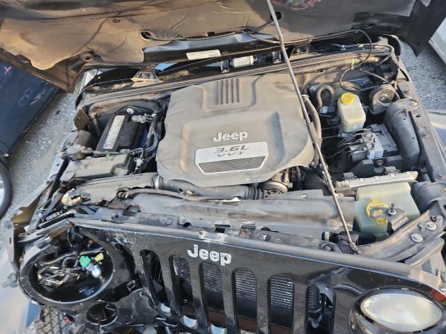 1C4BJWEG0DL678668 - 2013 JEEP WRANGLER U SAHARA BLACK photo 12