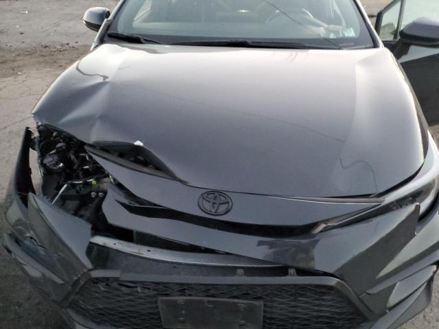 5YFS4MCE5PP162721 - 2023 TOYOTA COROLLA SE Schwarz Foto 11