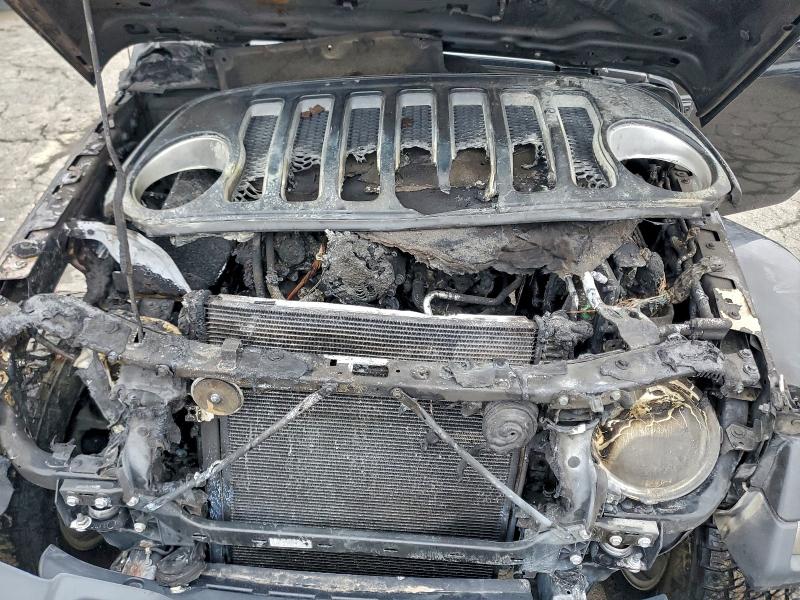 1C4HJXEG6JW192182 - 2018 JEEP WRANGLER U SAHARA შავი ფოტო 11