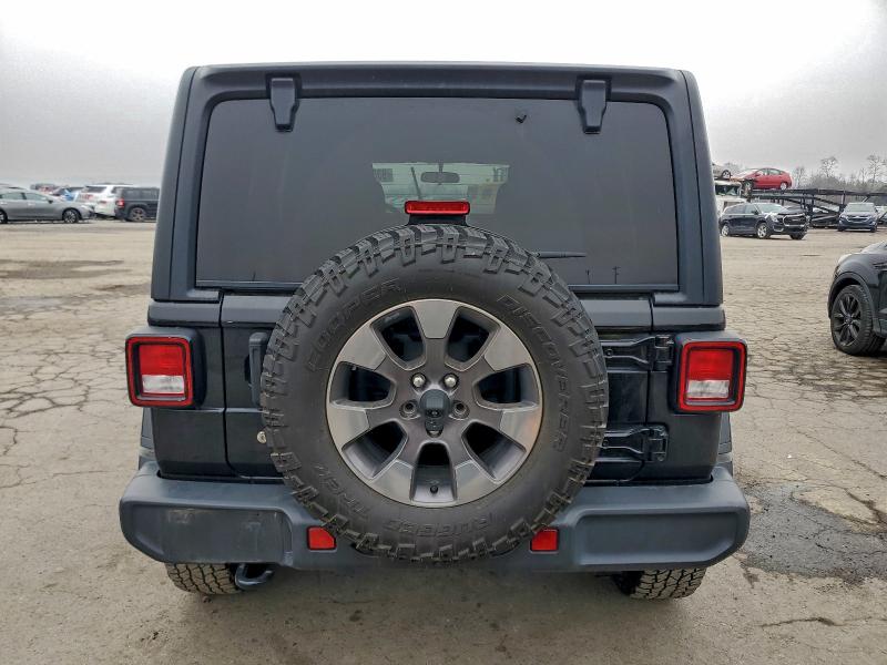 1C4HJXEG6JW192182 - 2018 JEEP WRANGLER U SAHARA შავი ფოტო 6