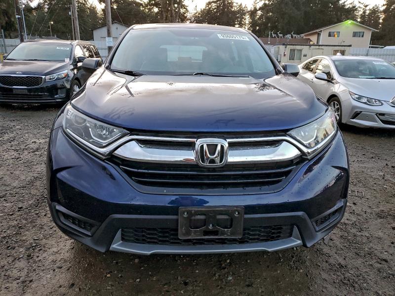 2HKRW6H37JH204502 - 2018 HONDA CR-V LX Blau Foto 5