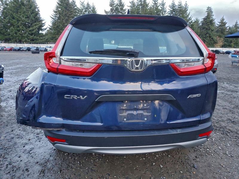 2HKRW6H37JH204502 - 2018 HONDA CR-V LX Blau Foto 6
