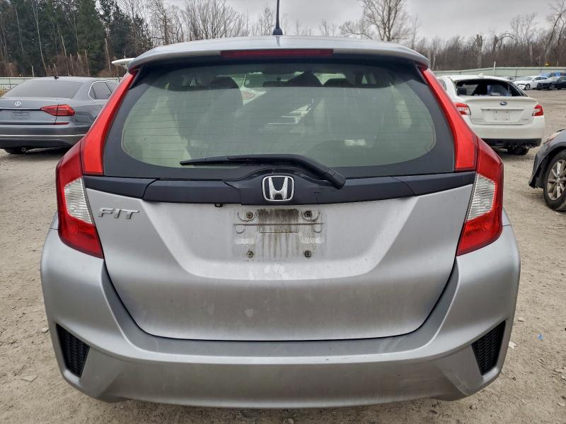 JHMGK5H54HS008719 - 2017 HONDA FIT LX Gümüş fotoğraf 6