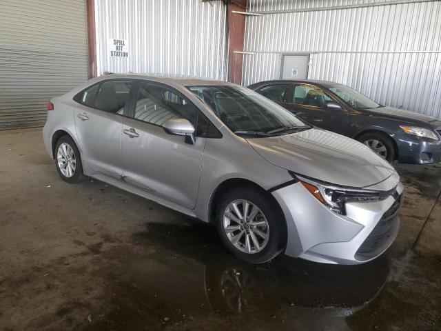 JTDBCMFE9R3033617 - 2024 TOYOTA COROLLA LE SILVER photo 4