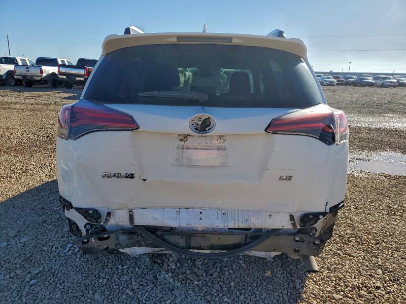 JTMZFREV7HJ138011 - 2017 TOYOTA RAV4 LE WHITE photo 6