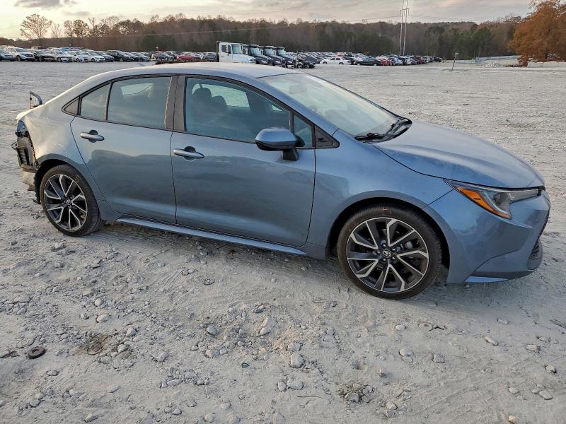 5YFEPMAE0NP293799 - 2022 TOYOTA COROLLA LE BLUE photo 4