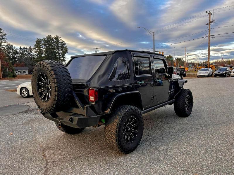 1J4BA3H10BL531974 - 2011 JEEP WRANGLER U SPORT Schwarz Foto 4
