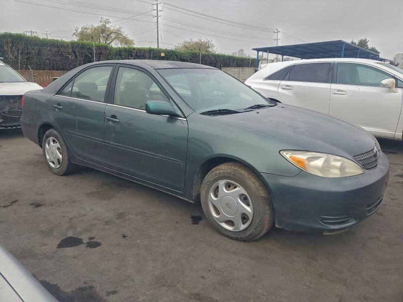 JTDBE30K420099583 - 2002 TOYOTA CAMRY LE GREEN photo 4