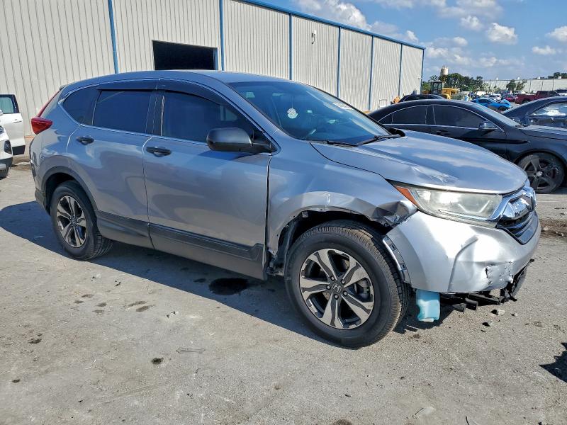 2HKRW5H33KH421668 - 2019 HONDA CR-V LX SILVER photo 4