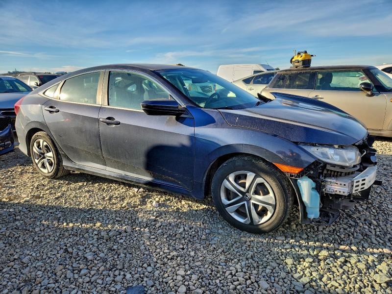 2HGFC2F58HH511626 - 2017 HONDA CIVIC LX ლურჯი ფოტო 4