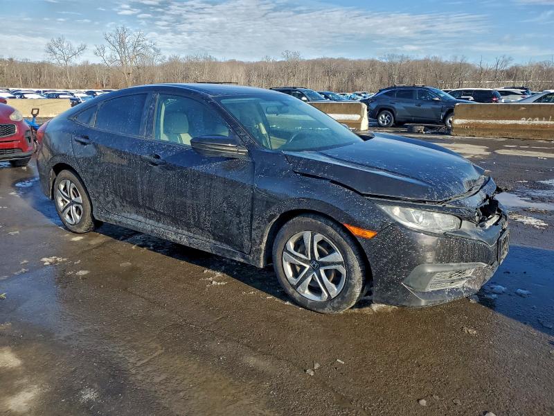 2HGFC2F58HH567632 - 2017 HONDA CIVIC LX BLACK photo 4