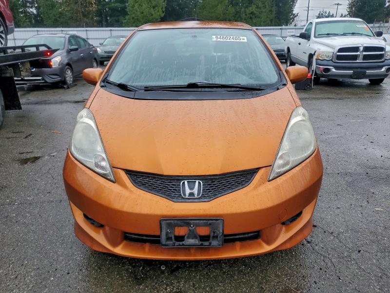 JHMGE88419S025415 - 2009 HONDA FIT SPORT ORANGE photo 5
