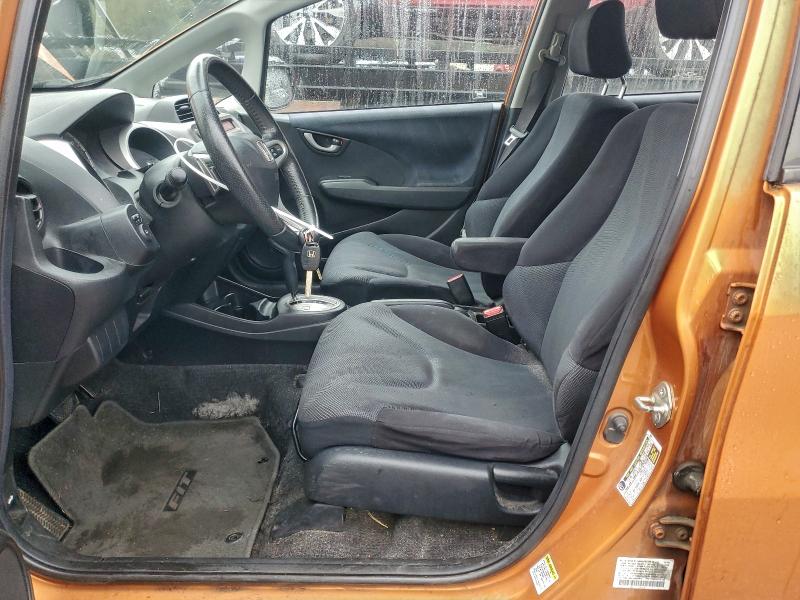 JHMGE88419S025415 - 2009 HONDA FIT SPORT ORANGE photo 7