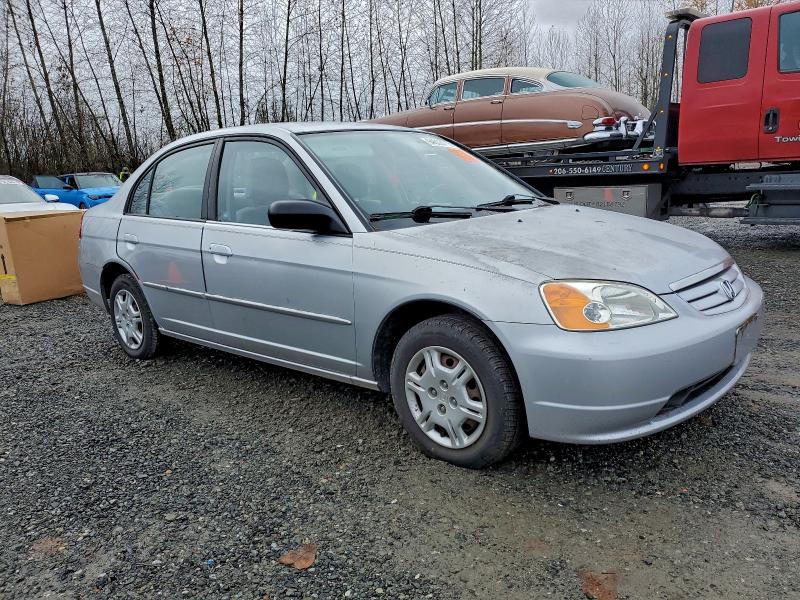 2HGES15542H610512 - 2002 HONDA CIVIC LX SILVER photo 4