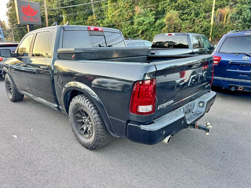1C6RR7YT3JS199417 - 2018 RAM 1500 REBEL Schwarz Foto 3